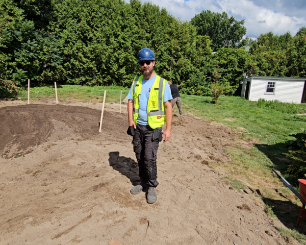 Septic system maintenance work underway on residential property